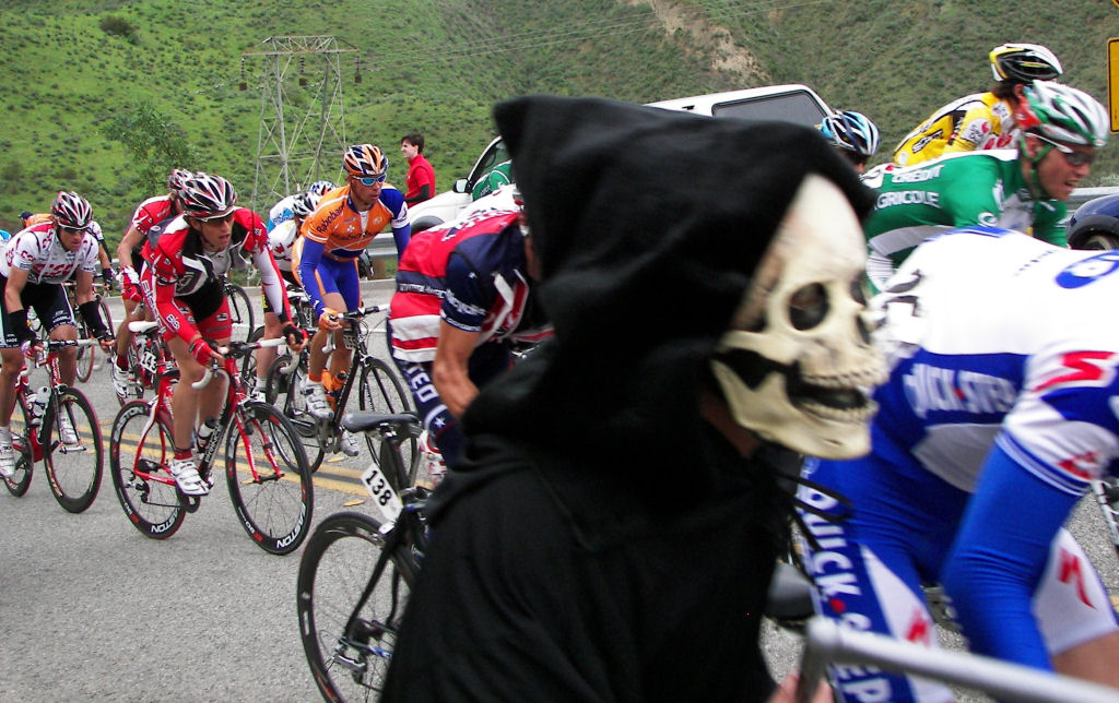 Grim Reaper running with the peloton