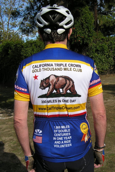 Back of Gold Thousand Mile Club Jersey